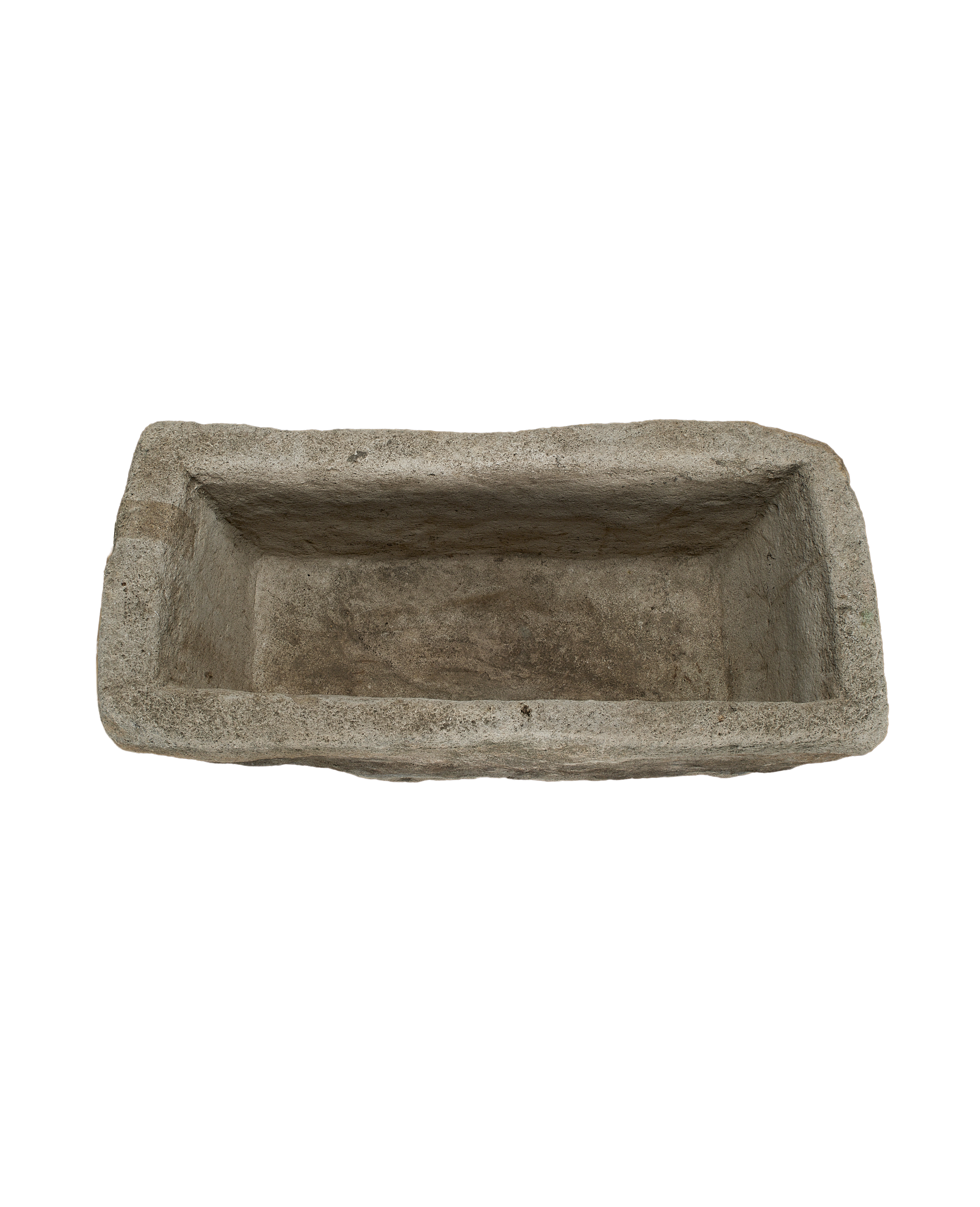 Vintage rectangular limestone trough, top view highlights weathered texture and aged interior.