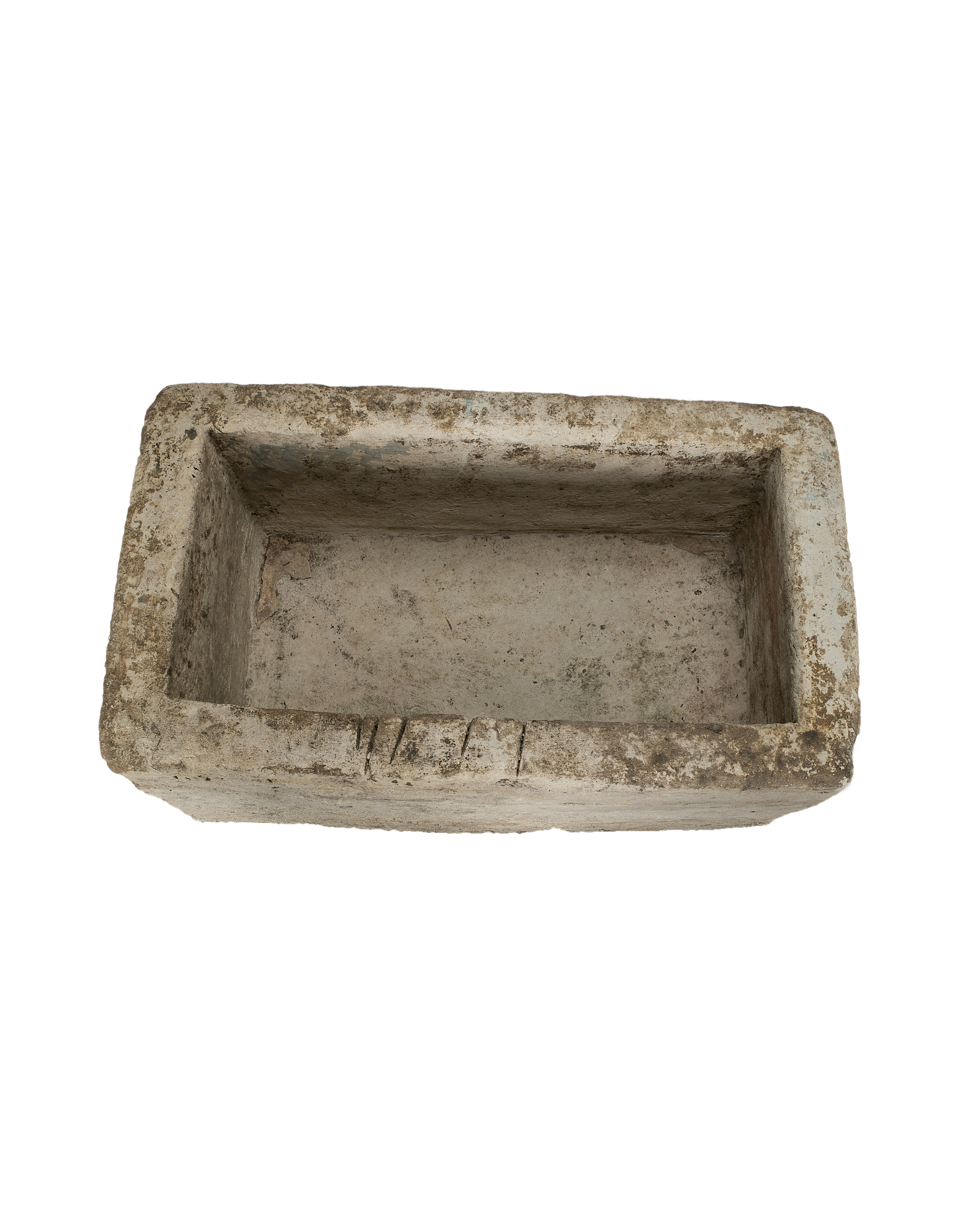 Vintage rectangular limestone trough, weathered gray surface, showing interior and textured rim details.
