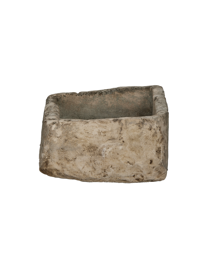 Vintage rectangular limestone trough, showing weathered texture and subtle interior view from above.