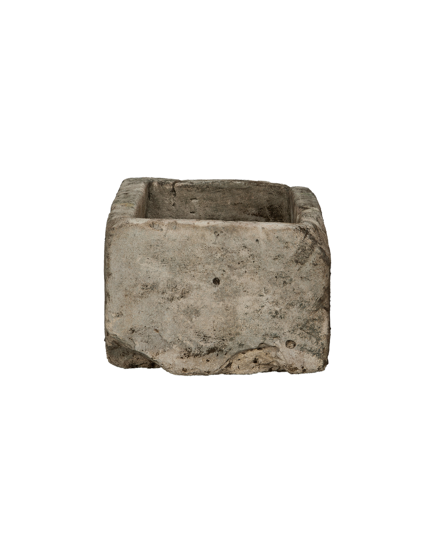 Vintage Indonesian limestone trough, top view reveals rustic, weathered details and unique texture.