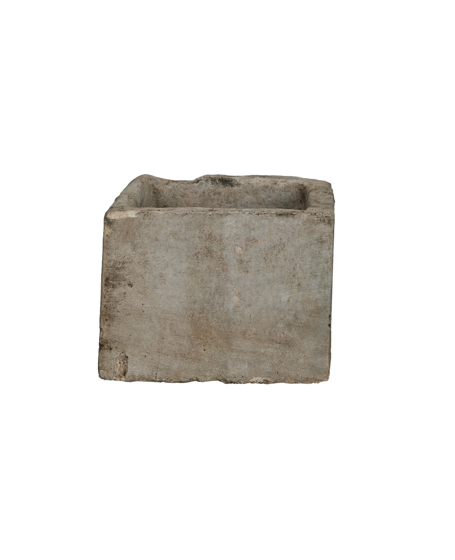 Vintage Indonesian rectangular limestone trough, detailed side view shows rough texture and unique weathered patina.