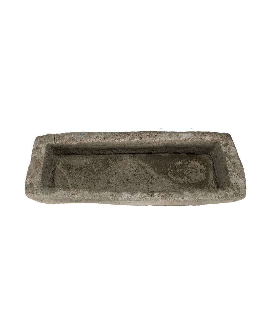 Vintage Indonesian rectangular limestone trough, top-down view showing interior texture and condition.