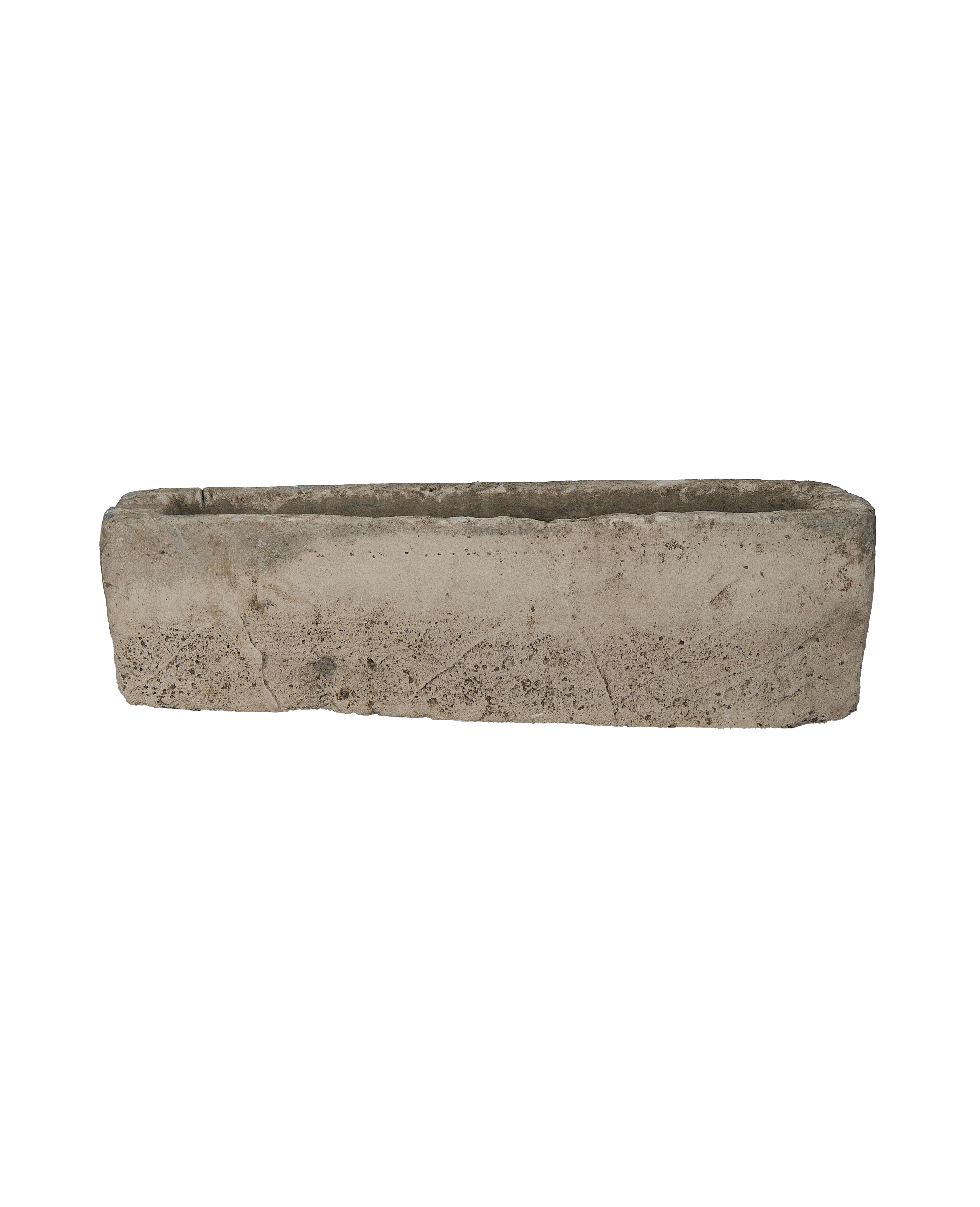 Vintage rectangular limestone trough, pale beige, with rough weathered texture, Indonesia.