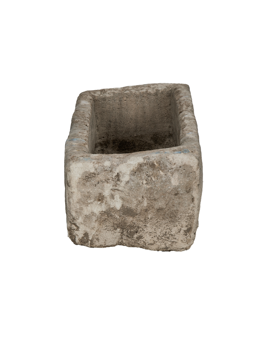 Vintage Indonesian limestone trough, top-down view showing interior depth and weathered texture.