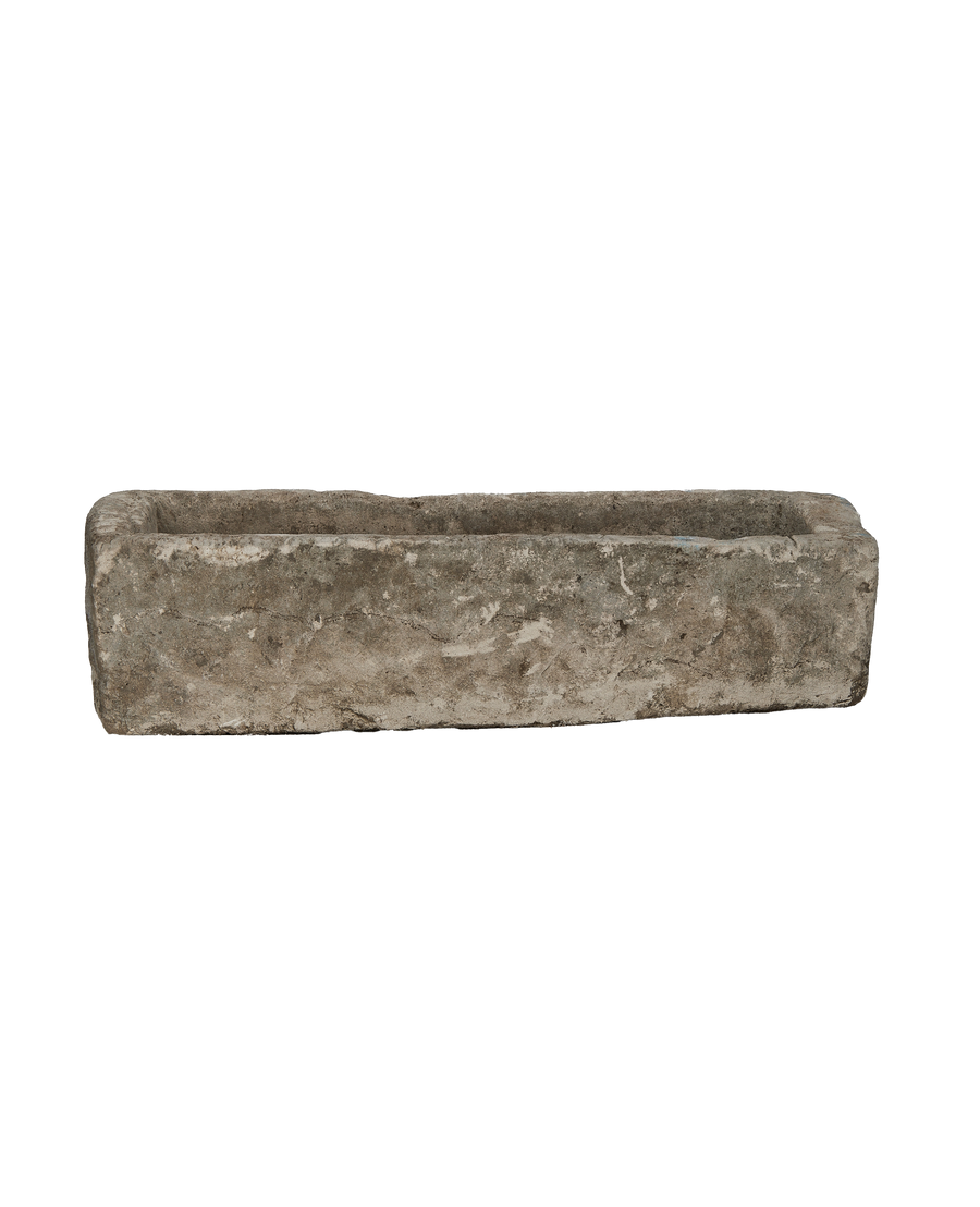 Full top-down view of vintage rectangular limestone trough, showcasing weathered texture.