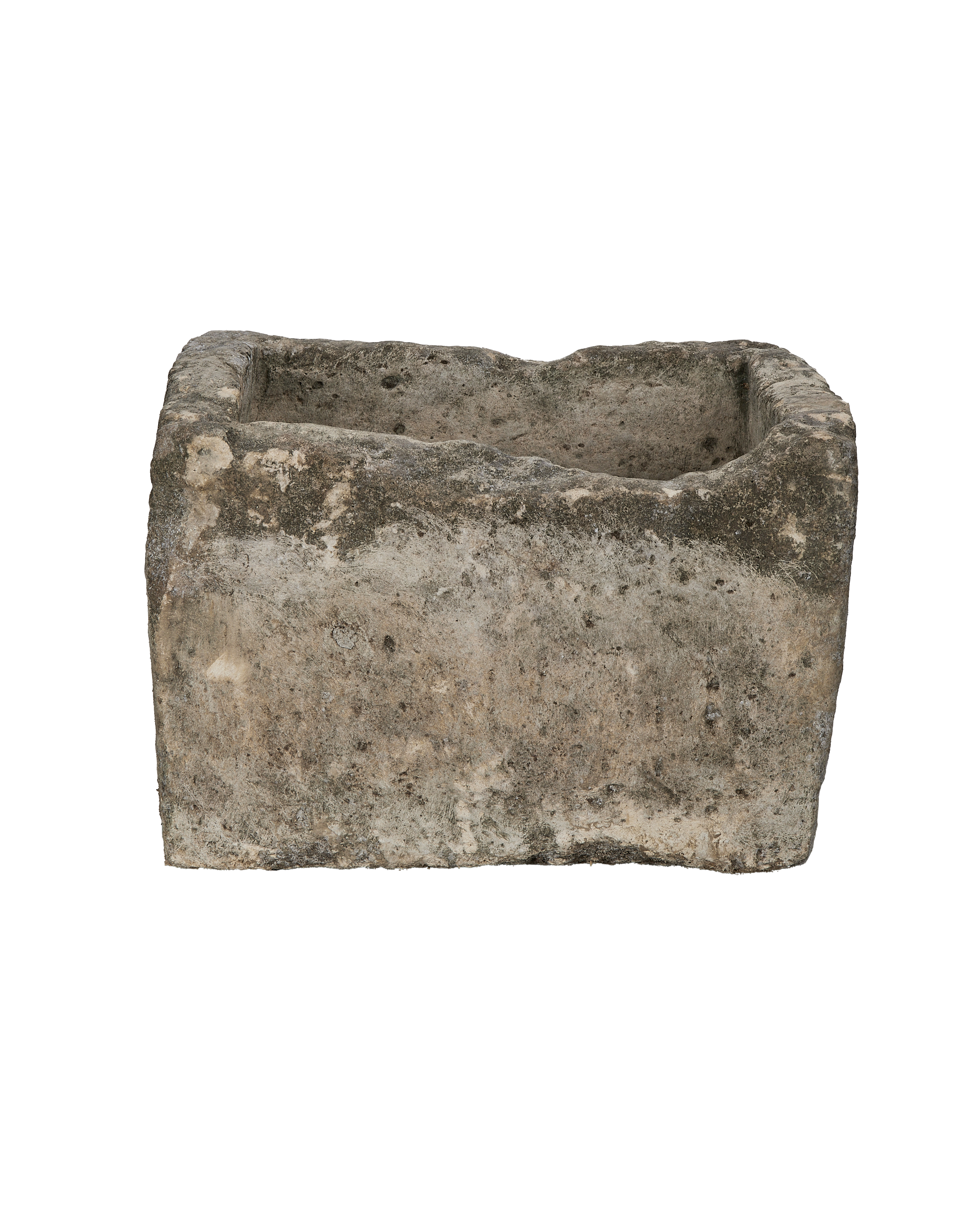 Vintage rectangular limestone trough, showing one side's weathered texture and natural imperfections.