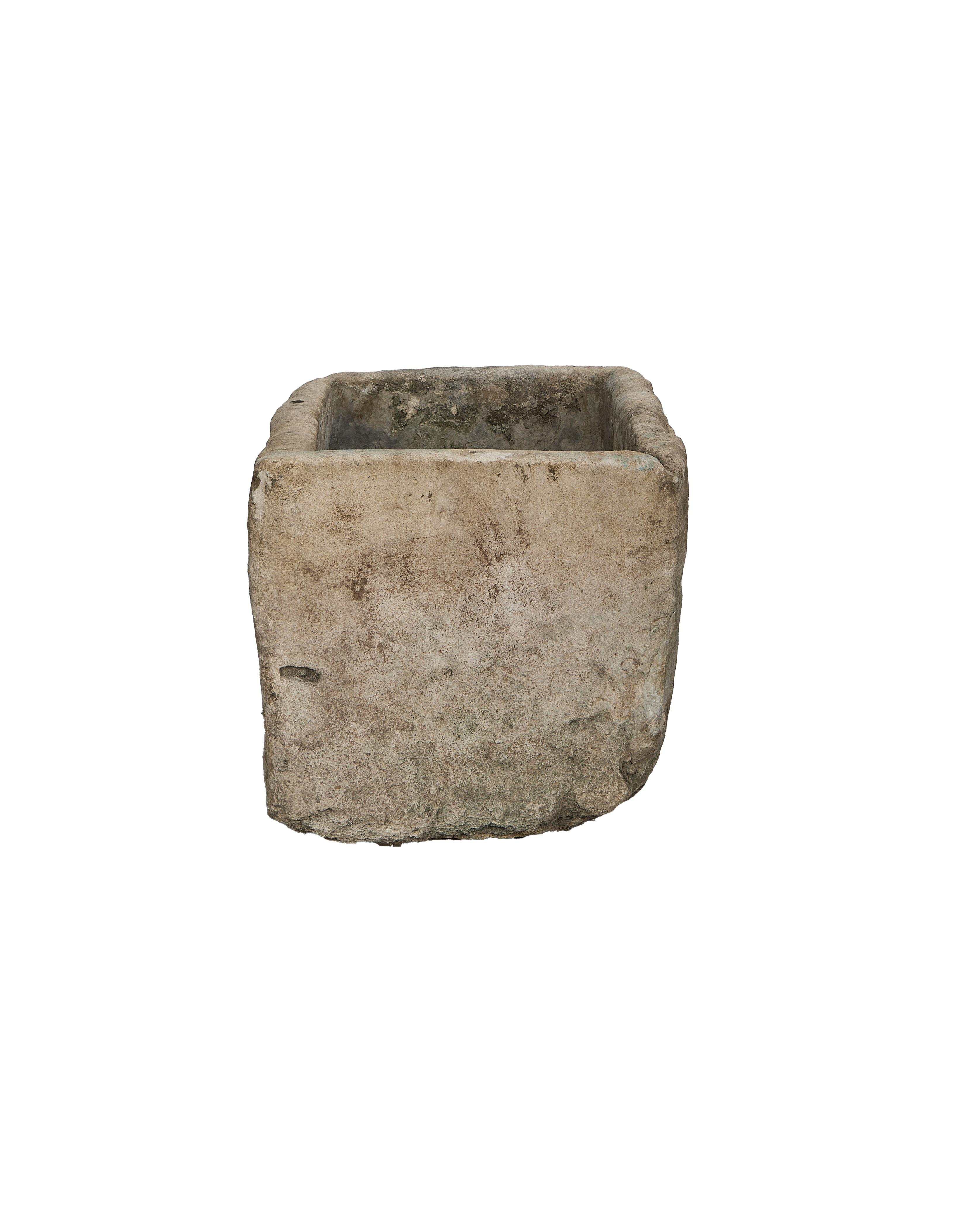 Vintage Indonesian limestone trough, square shape, showing rough weathered exterior texture.