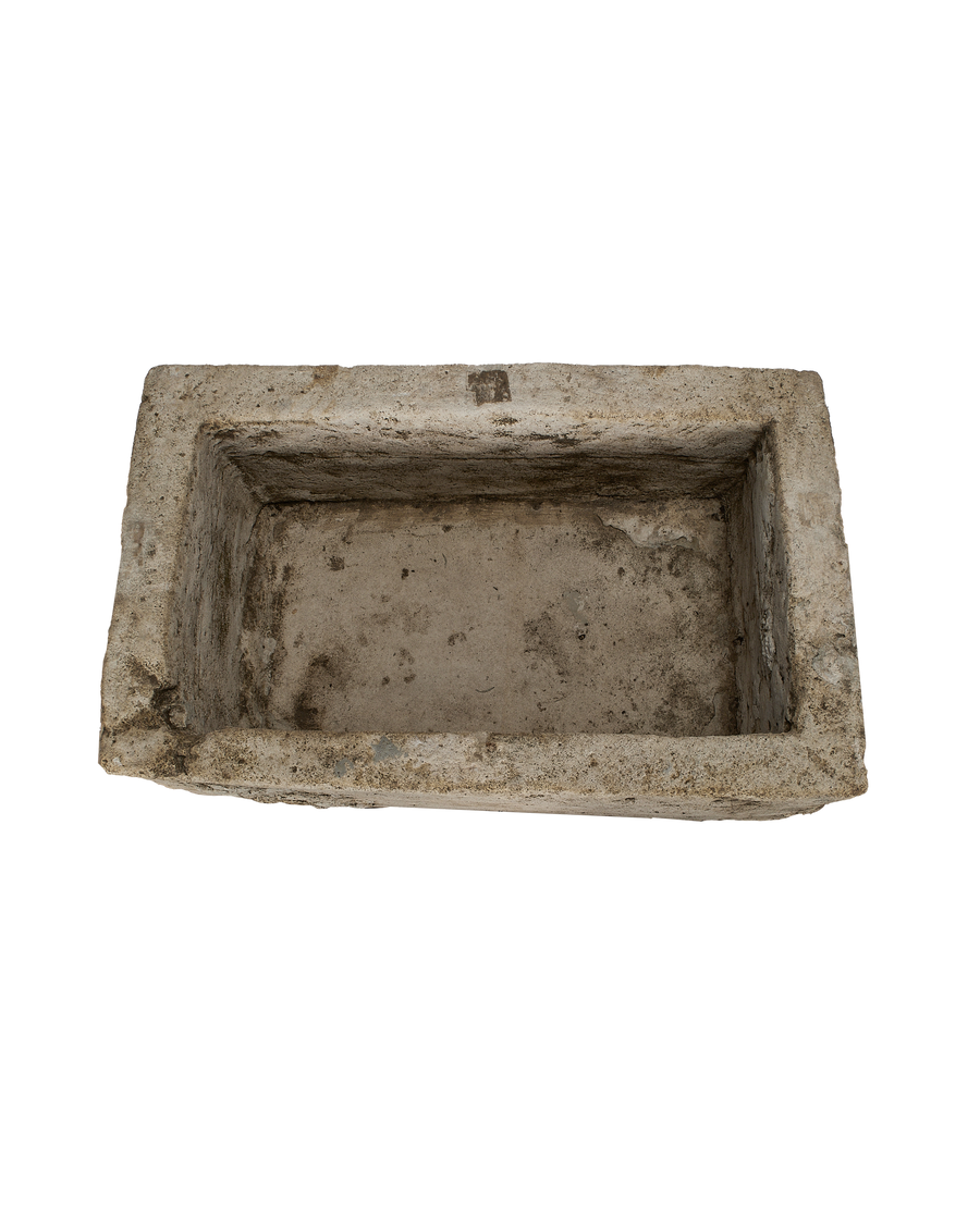 Vintage Indonesian rectangular limestone trough showing full top interior, weathered texture.