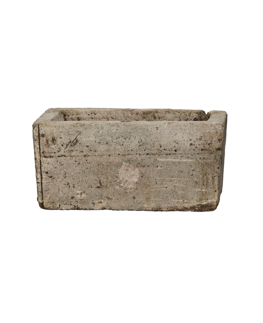 Vintage Indonesian limestone trough, rectangular, OAK, showcasing weathered surface texture, side view.