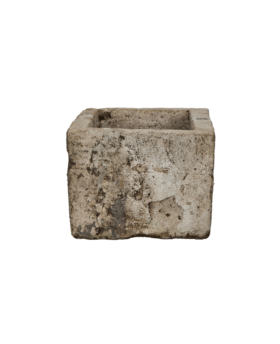 Vintage Indonesian limestone trough, showing distressed texture and weathered gray patina.