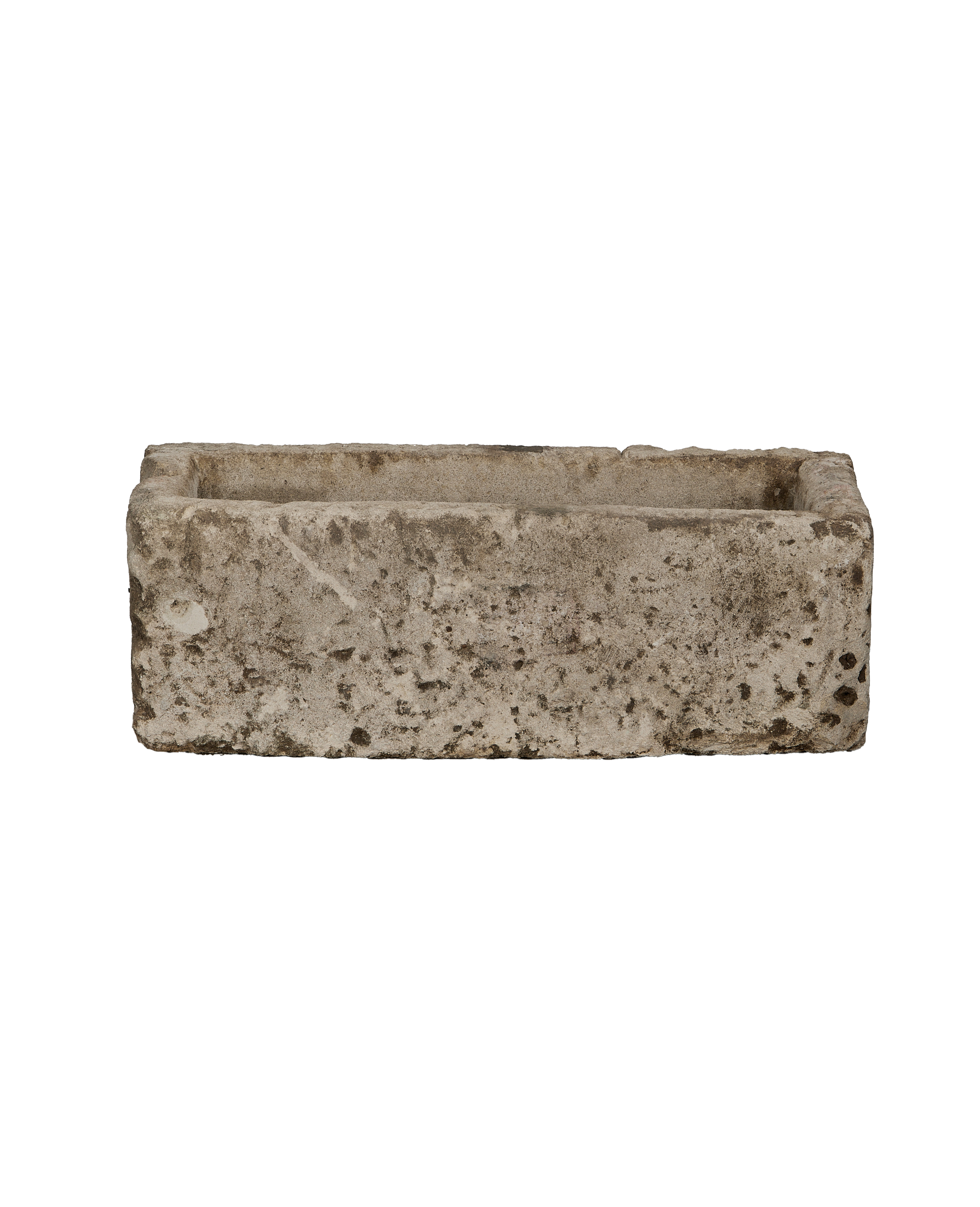 Vintage rectangular Indonesian limestone trough, showing detail of aged texture and dark patina.