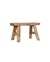 wooden rustic bench legs forming a small seat