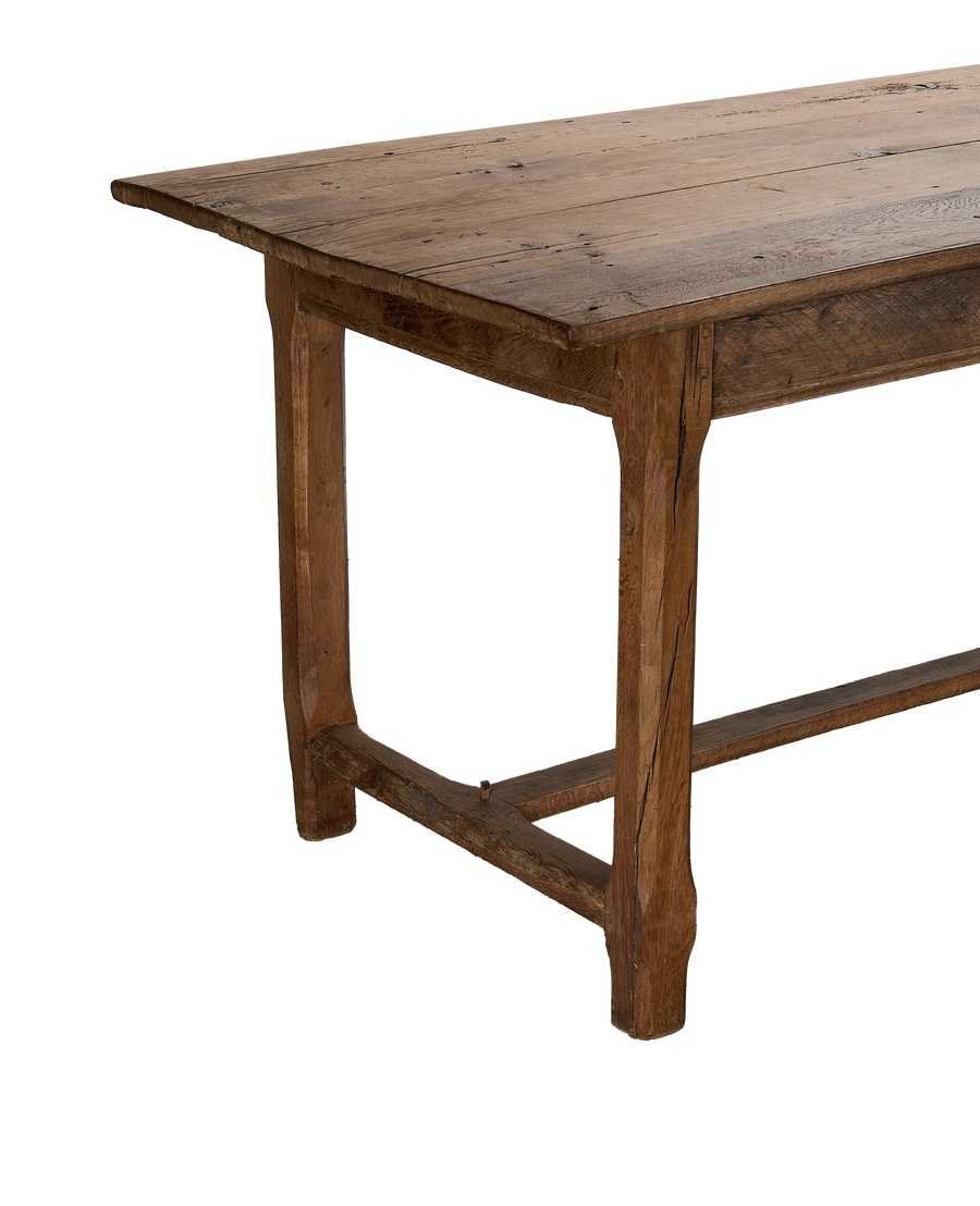 Vintage French oak farm table, showing the distressed tabletop and sturdy base construction.